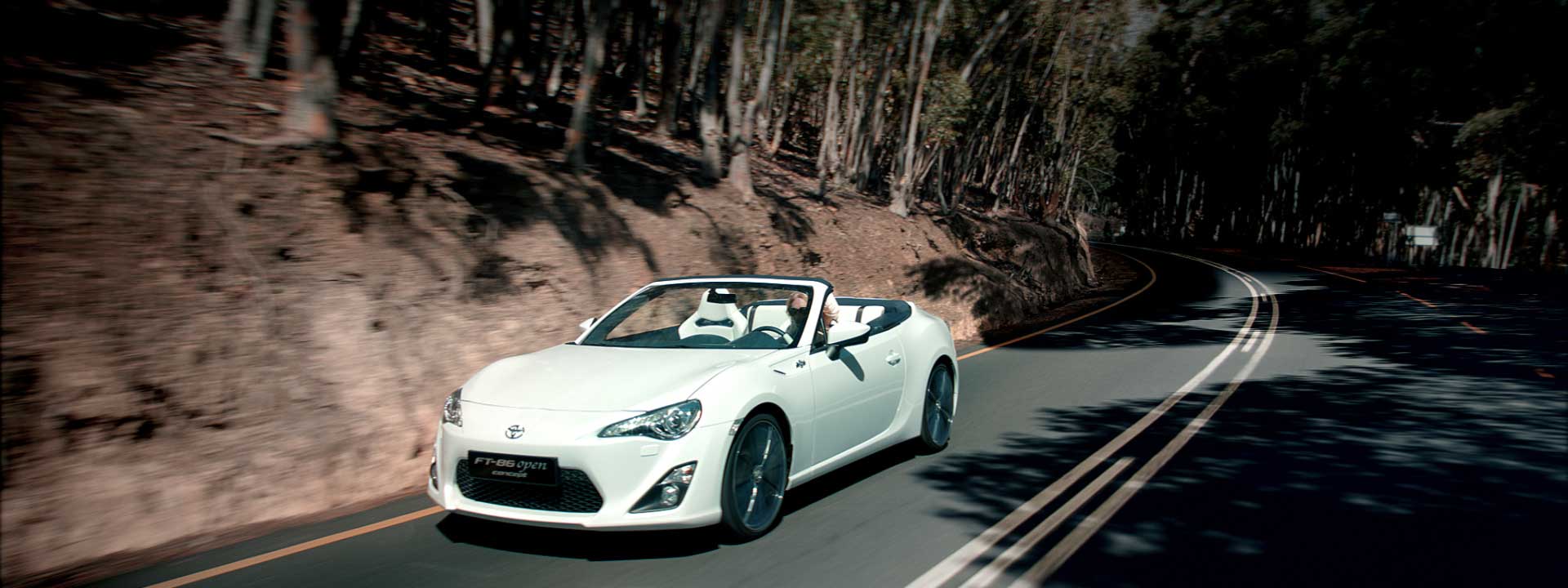 Woman behind steering wheel. Still from Toyota FT-86 open – Commercial