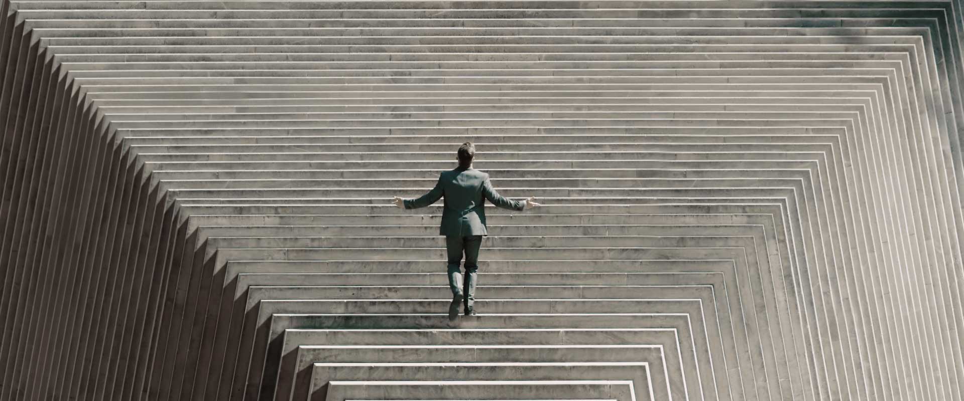 Men and stairs. Still from Lexus LX2016 Commercial.