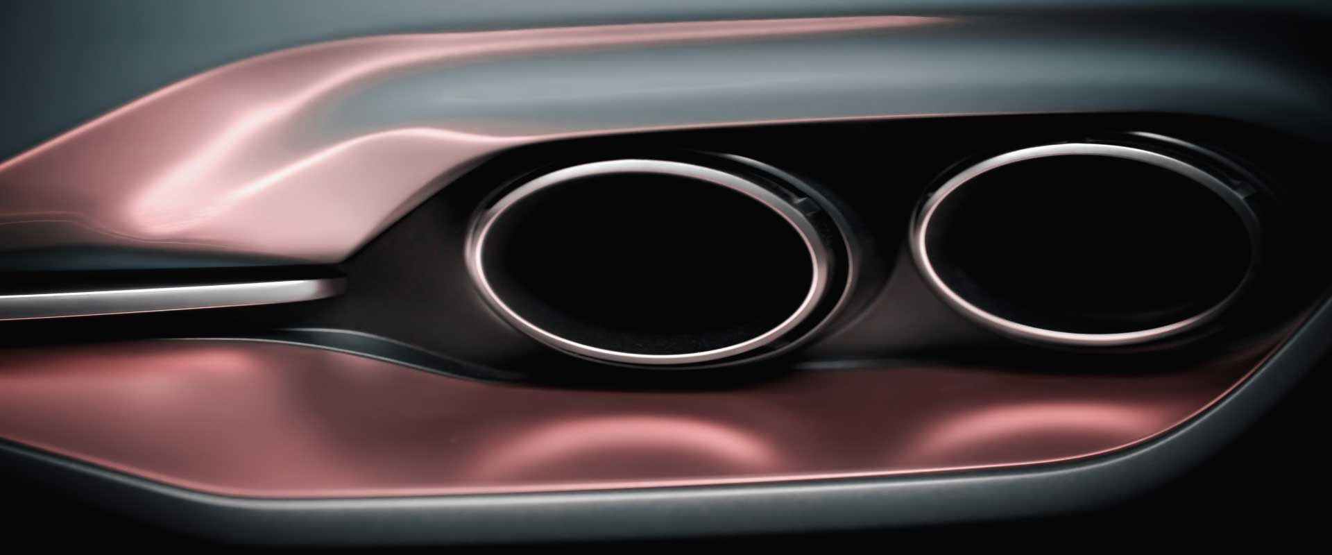 Detail exhaust pipes. Still from Hyundai Genesis commercial.