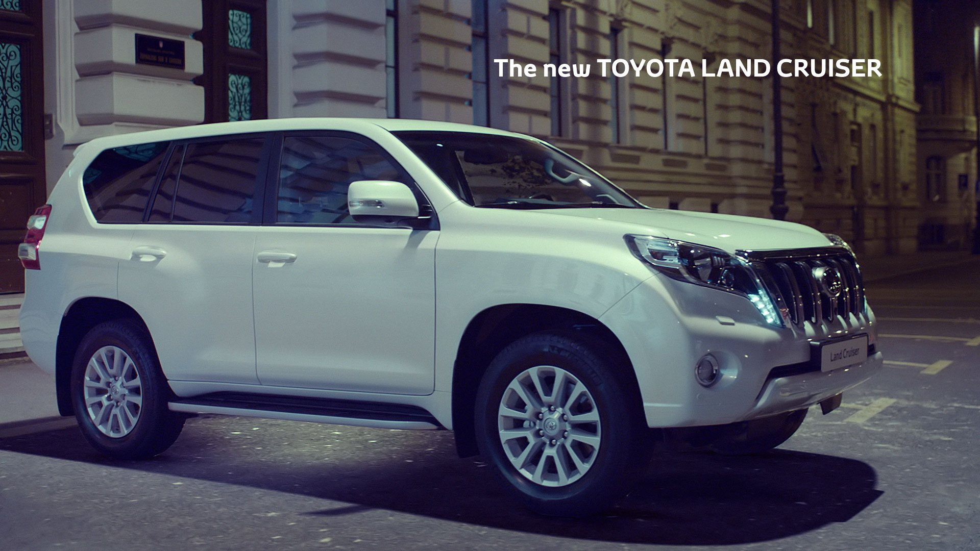 Car in parking lot. Still from Toyota Landcruiser.